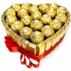  Tort inimă făcut din ciocolată Merci și Ferrero Rocher