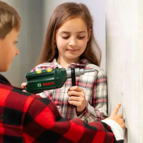 Burghiu cu ciocan Bosch pentru copii cu gaurire sonora si rotativa + casca galbena Klein